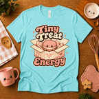 Tiny Treat Energy cute food graphic t-shirt cozy flat lay in aqua.