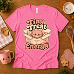 Tiny Treat Energy cute food graphic t-shirt cozy flat lay in charity pink.