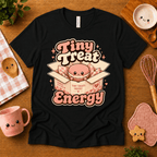 Tiny Treat Energy cute food graphic t-shirt cozy flat lay in black.