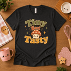 Tiny But Tasty cute food graphic t-shirt cozy flat lay in vintage black.