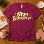 Stay Souper food graphic t-shirt cozy flat lay in berry.