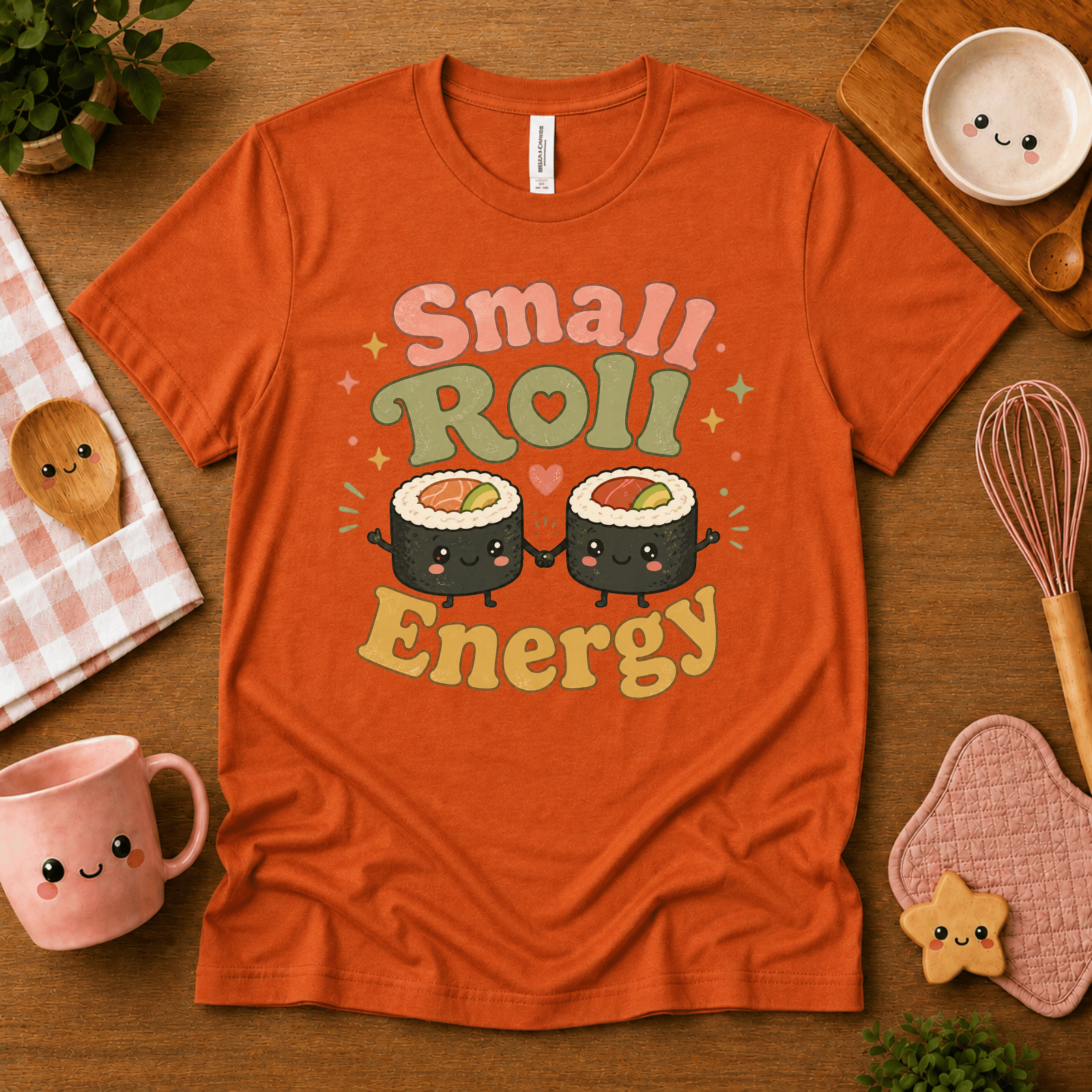 Small Roll Energy cute food graphic t-shirt cozy flat lay in burnt orange.