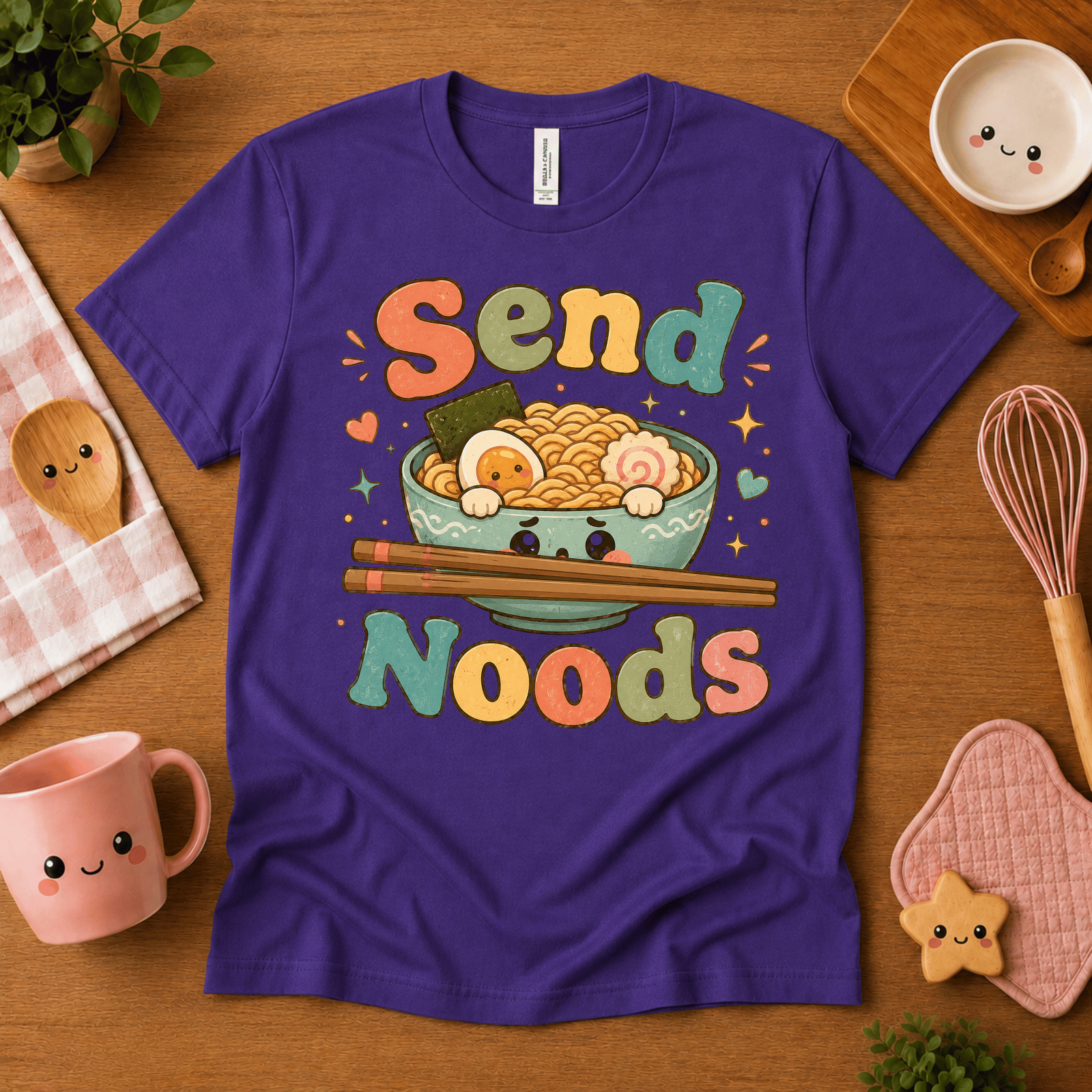 Send Noods cute food graphic t-shirt cozy flat lay in team purple.