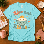 Rice and Shine cute food graphic t-shirt cozy flat lay in aqua.