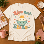 Rice and Shine cute food graphic t-shirt cozy flat lay in natural.
