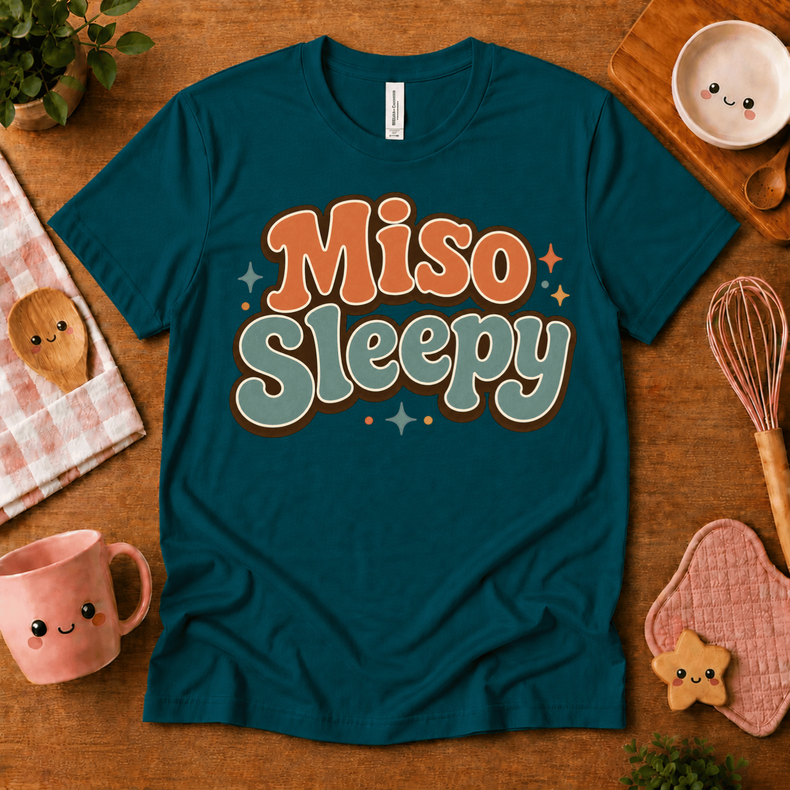 Miso Sleepy cute food graphic t-shirt cozy flat lay in deep teal.