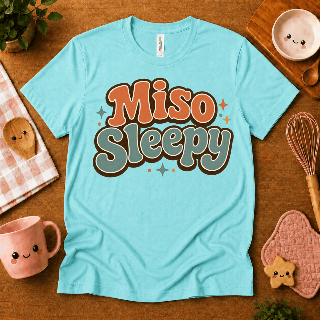 Miso Sleepy cute food graphic t-shirt cozy flat lay in aqua.