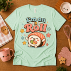 I'm On A Roll cute food graphic t-shirt cozy flat lay in mint.