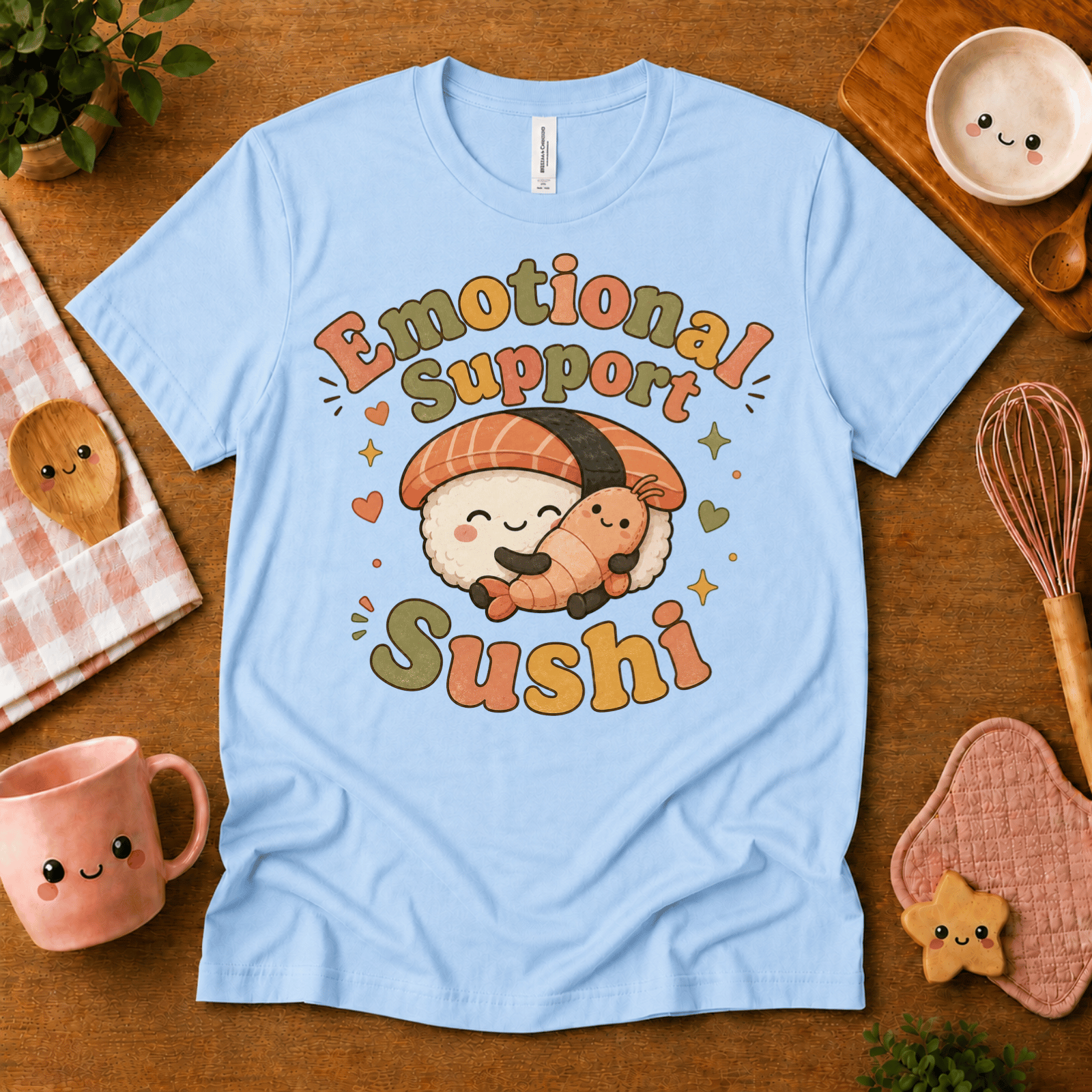 Emotional Support Sushi cute food graphic t-shirt cozy flat lay in baby blue.