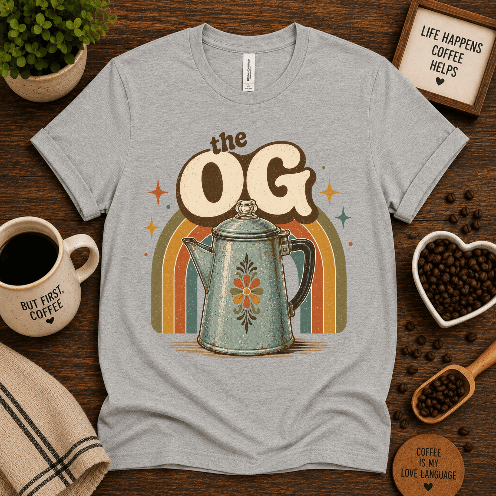 The OG coffee graphic t-shirt cozy flat lay in athletic heather.