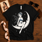 Moonlit Fairy pinup graphic t-shirt cozy flat lay in vintage black.