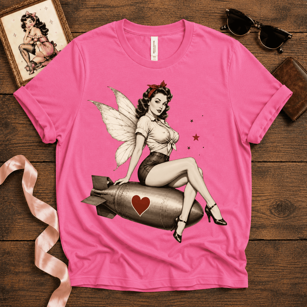 Love Bomb pinup fairy graphic t-shirt cozy flat lay in charity pink.