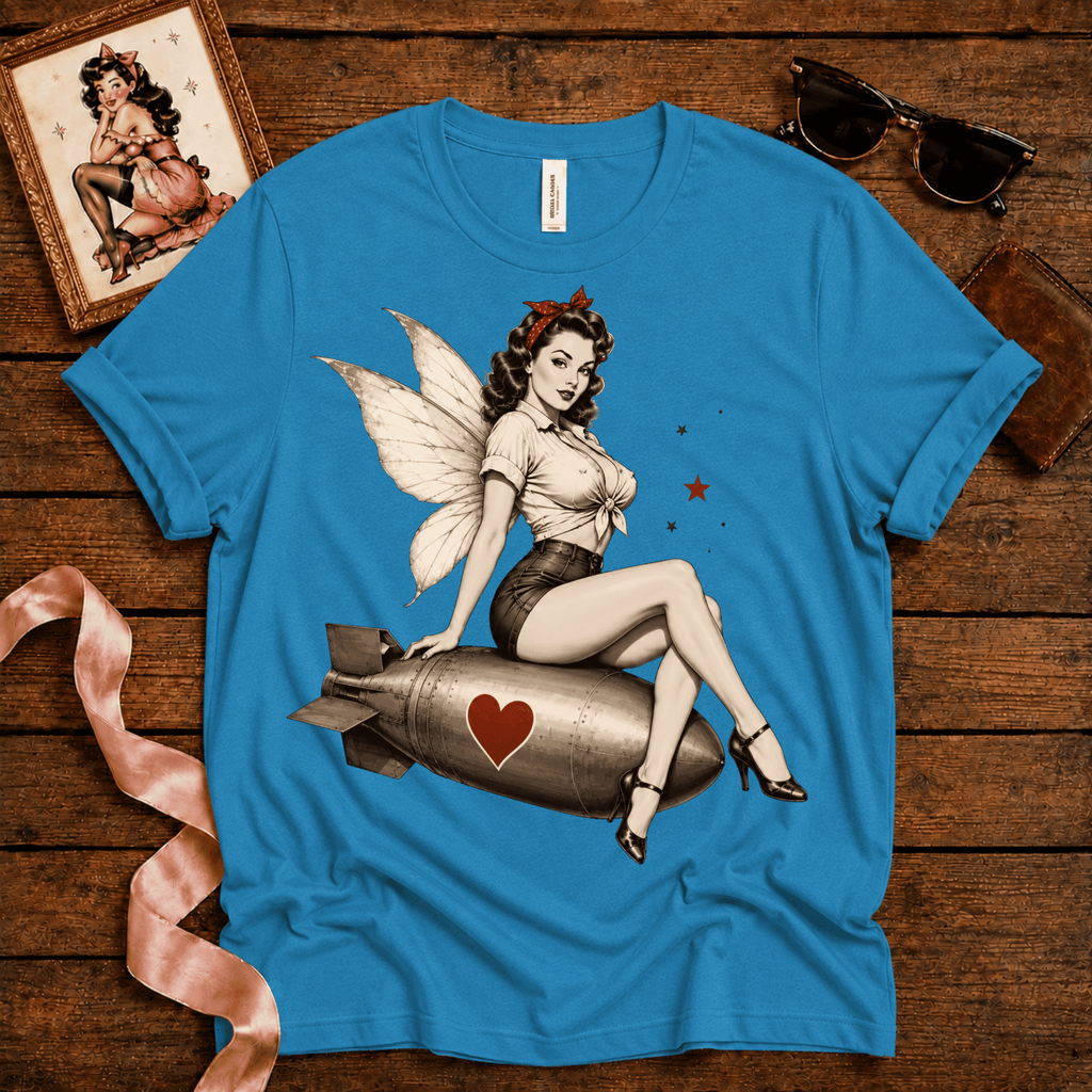 Love Bomb pinup fairy graphic t-shirt cozy flat lay in aqua.