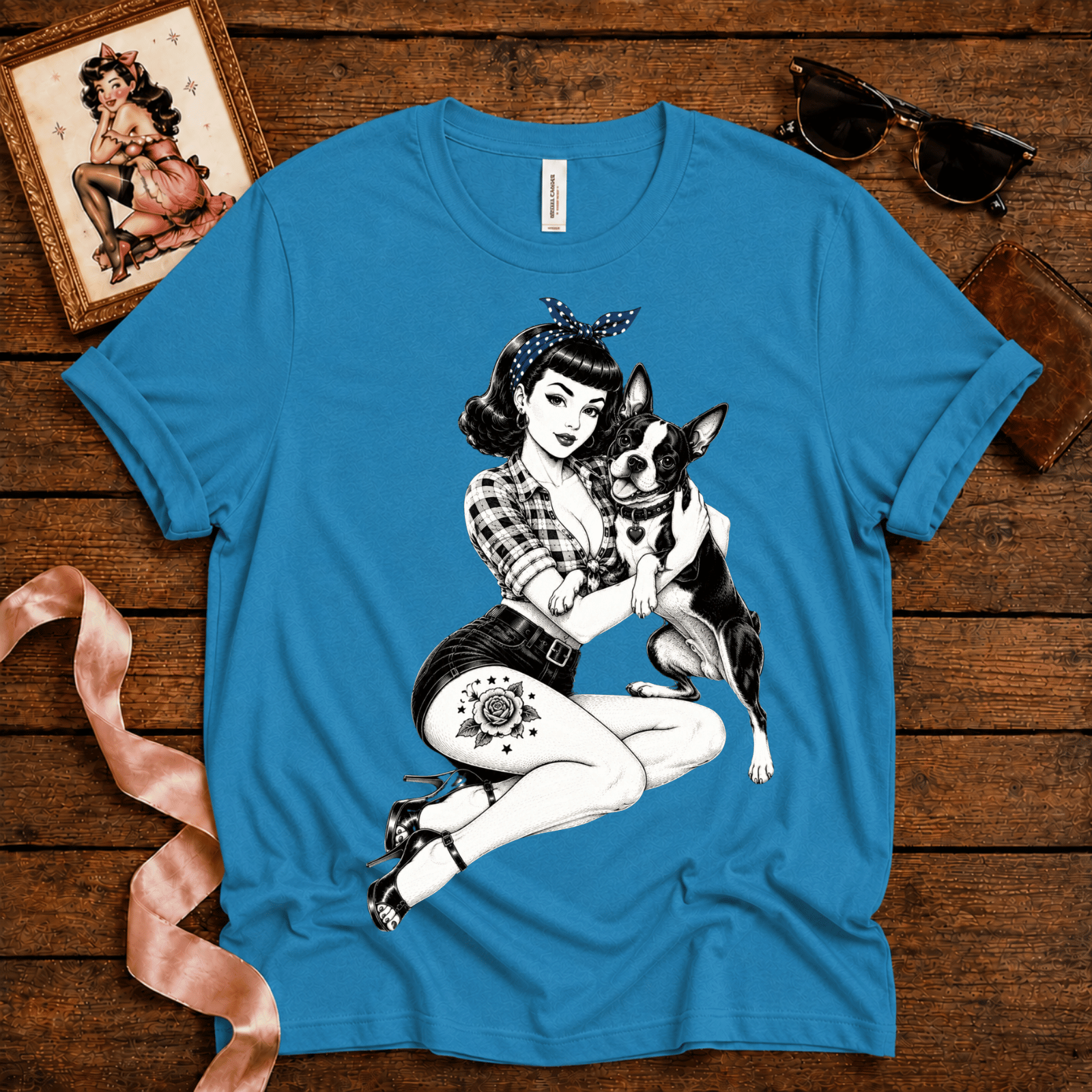 Boston Love pinup graphic t-shirt cozy flat lay in aqua.