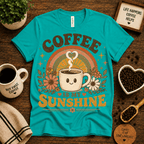 Coffee Is My Sunshine coffee graphic t-shirt cozy flat lay in heather sea green.