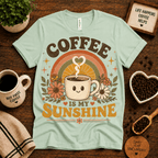 Coffee Is My Sunshine coffee graphic t-shirt cozy flat lay in mint.