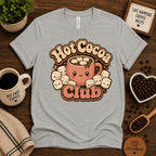 Hot Cocoa Club coffee graphic t-shirt cozy flat lay in athletic heather.