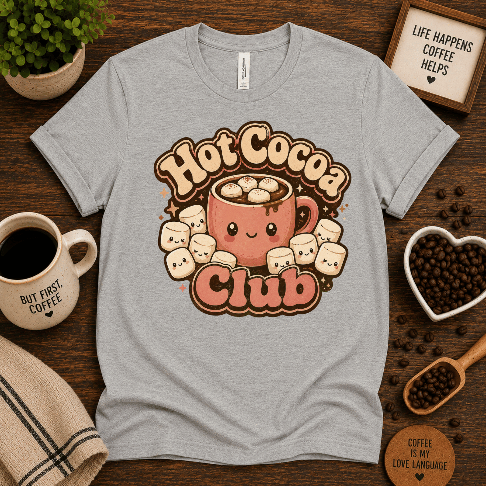 Hot Cocoa Club coffee graphic t-shirt cozy flat lay in athletic heather.