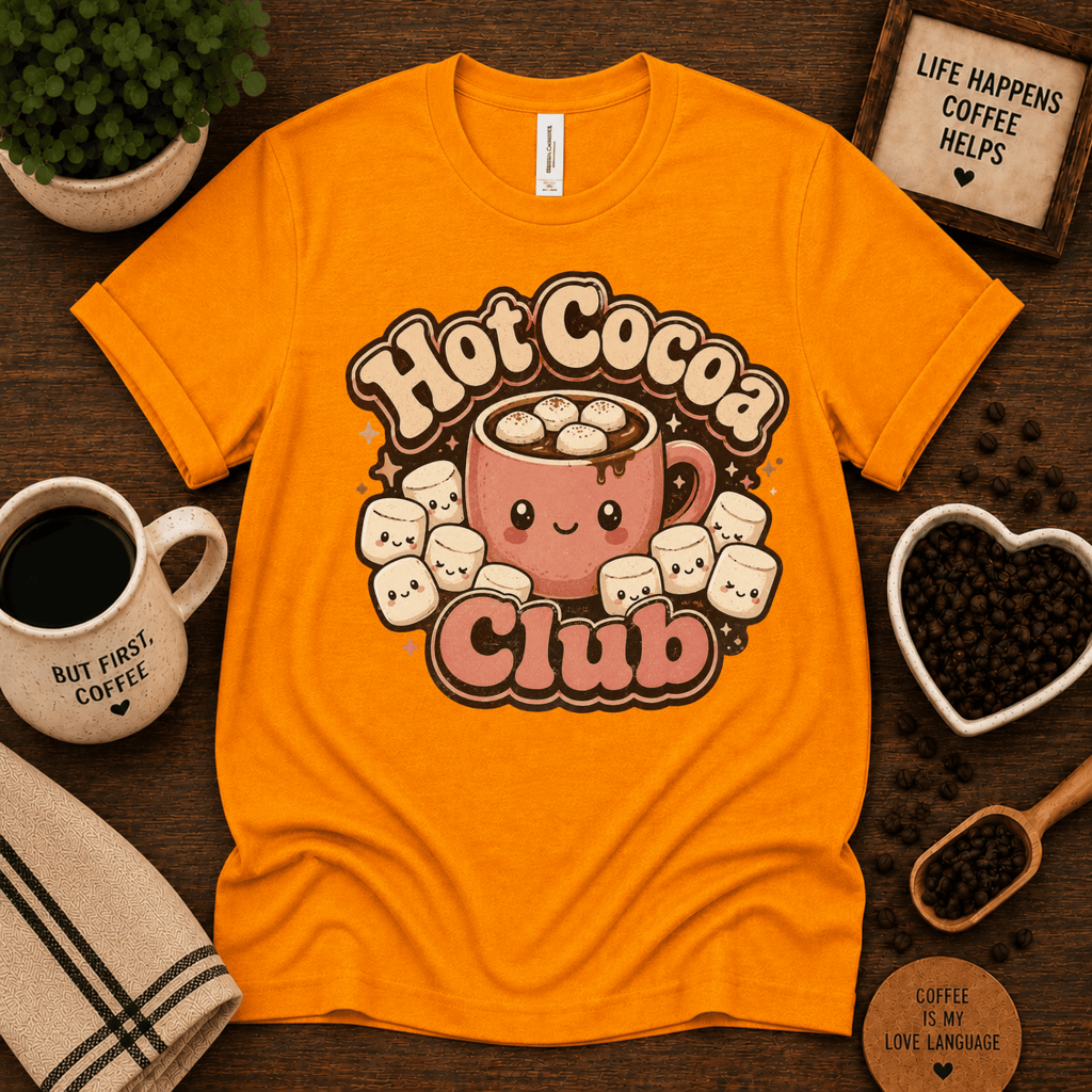 Hot Cocoa Club coffee graphic t-shirt cozy flat lay in gold.
