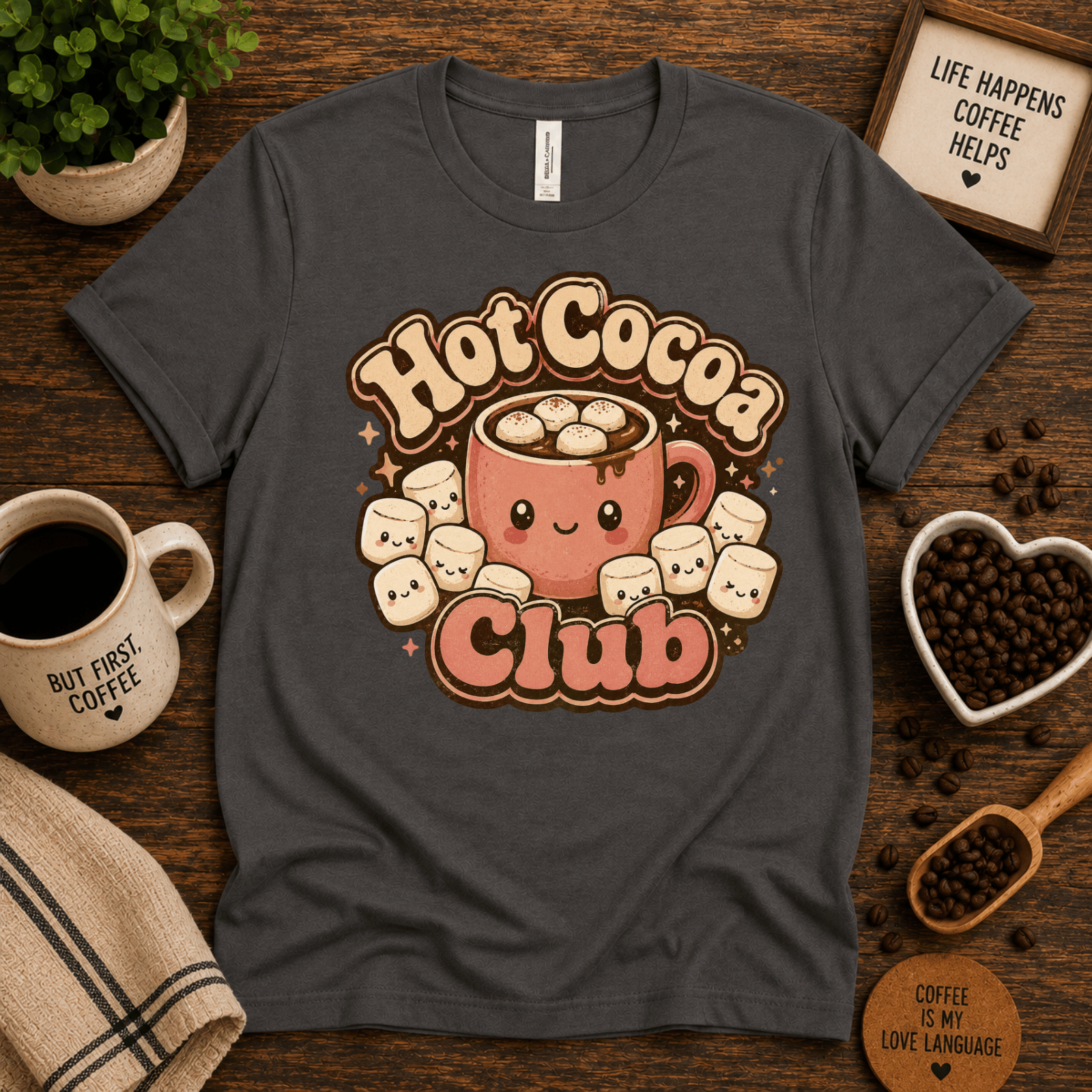 Hot Cocoa Club coffee graphic t-shirt cozy flat lay in asphalt.