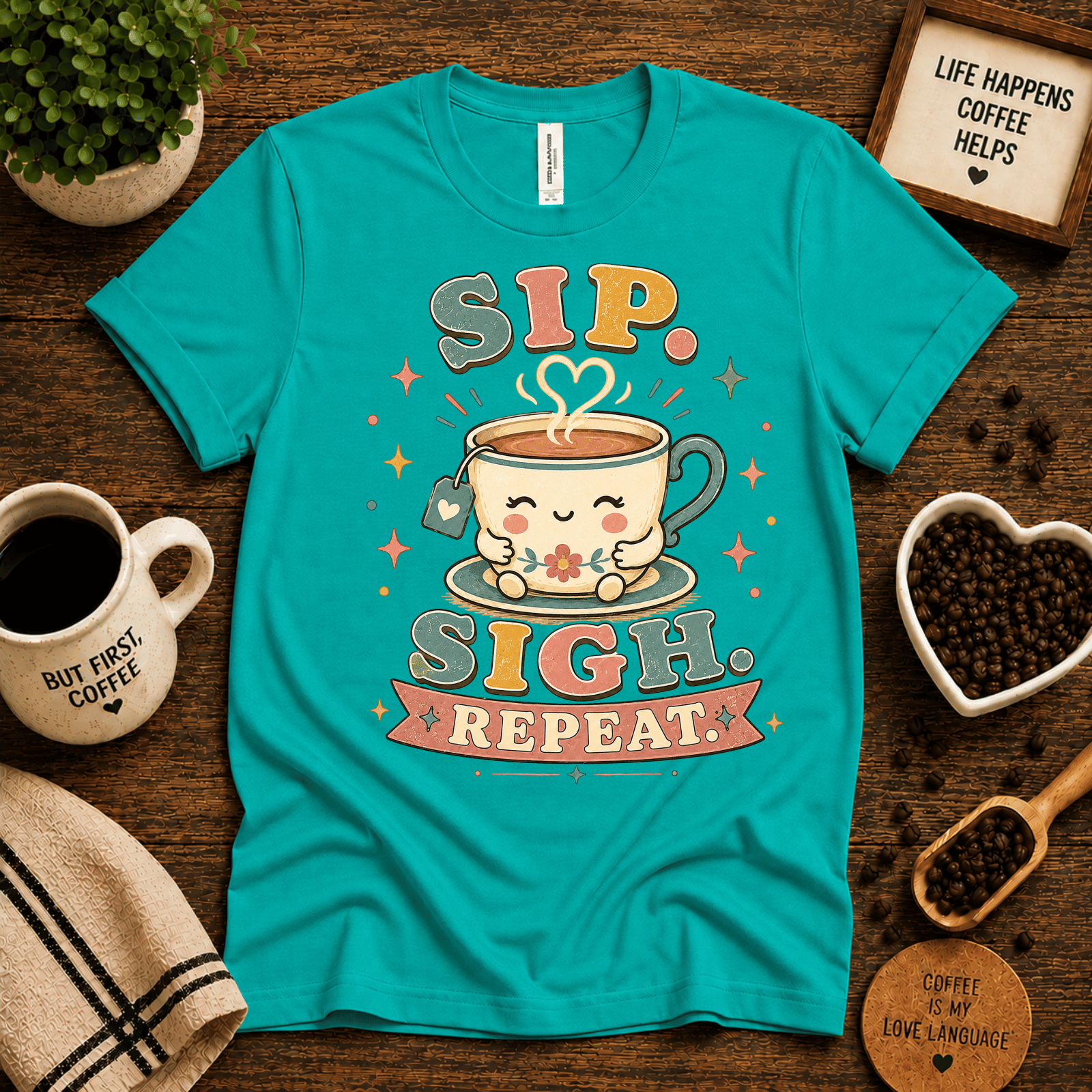 Sip. Sigh. Repeat. coffee graphic t-shirt cozy flat lay in heather sea green.