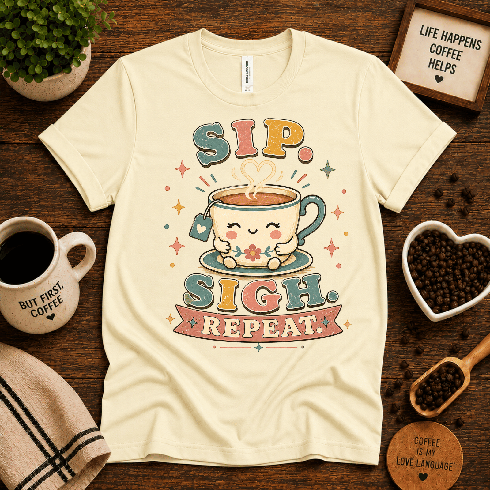Sip. Sigh. Repeat. coffee graphic t-shirt cozy flat lay in natural.