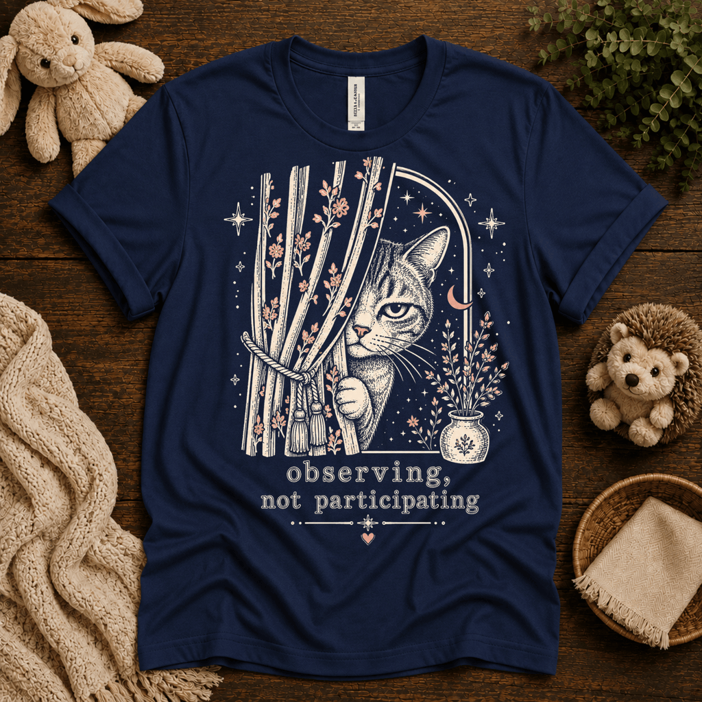 Cat Observing cute animal graphic t-shirt cozy flat lay in navy.