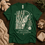 Cat Observing cute animal graphic t-shirt cozy flat lay in evergreen.