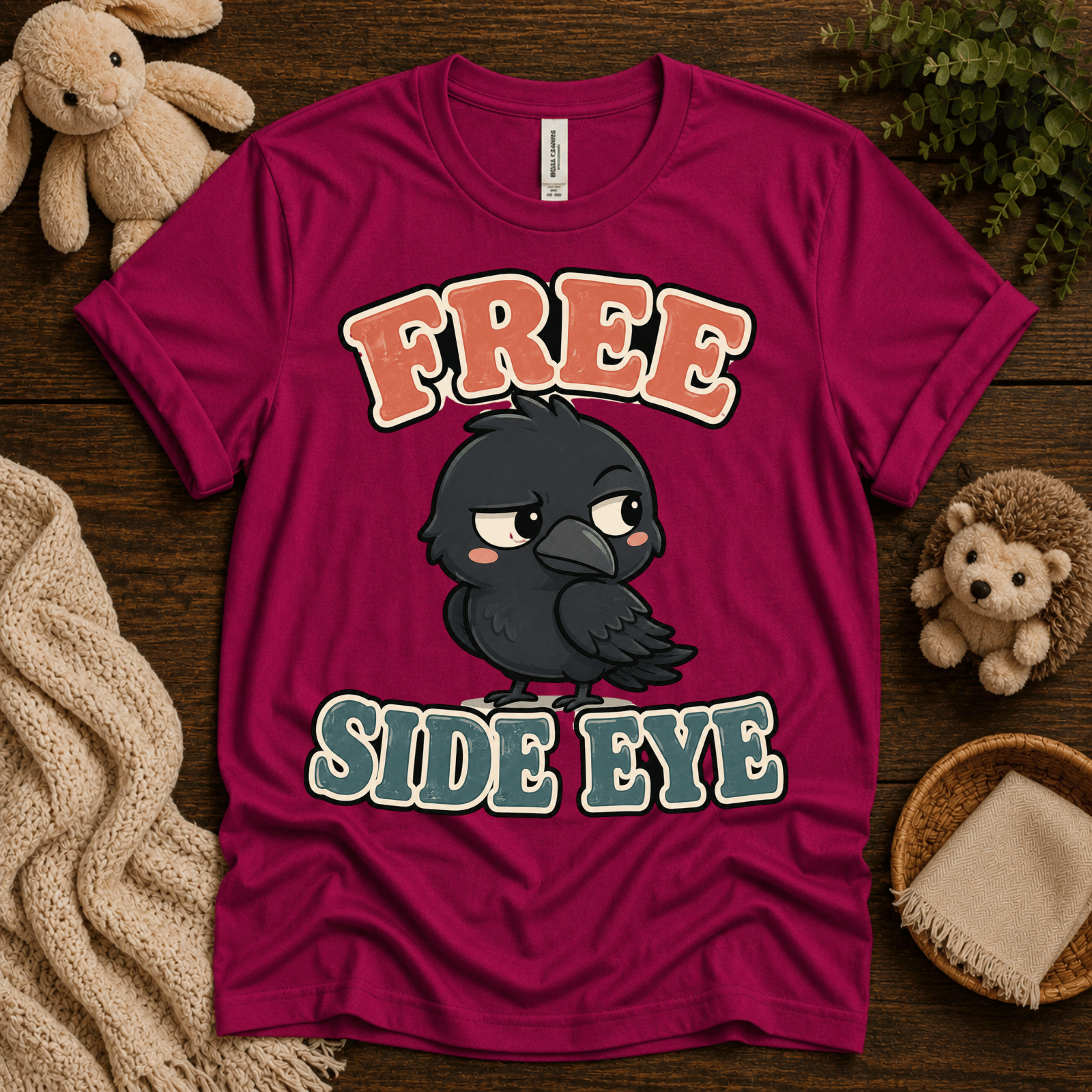 Free Side Eye cute animal graphic t-shirt cozy flat lay in berry.