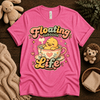 Floating Through Life cute animal graphic t-shirt cozy flat lay in charity pink.