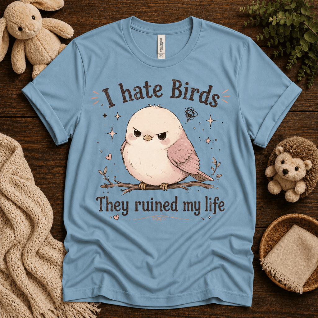 I Hate Birds cute animal graphic t-shirt cozy flat lay in baby blue.