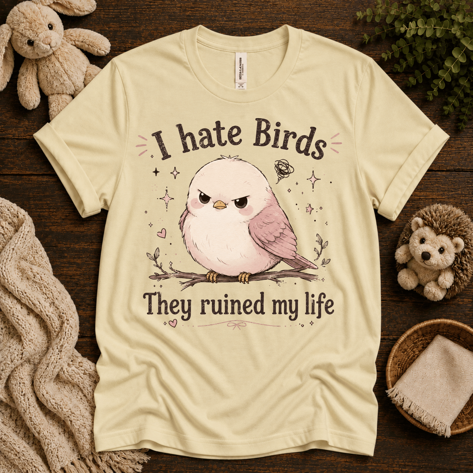 I Hate Birds cute animal graphic t-shirt cozy flat lay in natural.
