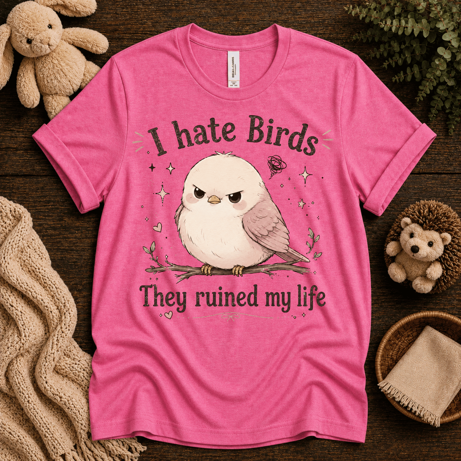 I Hate Birds cute animal graphic t-shirt cozy flat lay in charity pink.