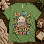 In My Little World cute animal graphic t-shirt cozy flat lay in leaf.