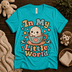In My Little World cute animal graphic t-shirt cozy flat lay in heather sea green.