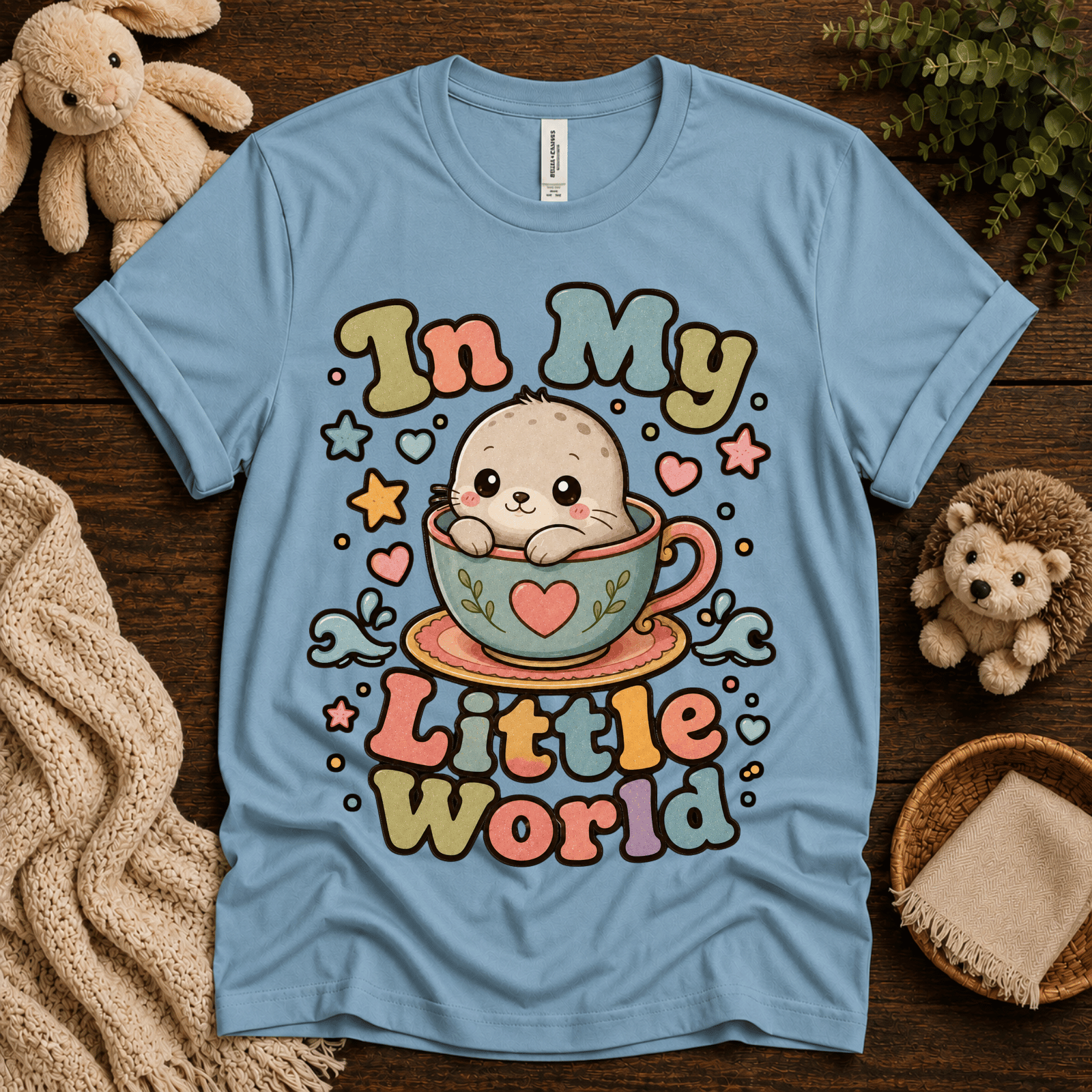 In My Little World cute animal graphic t-shirt cozy flat lay in baby blue.