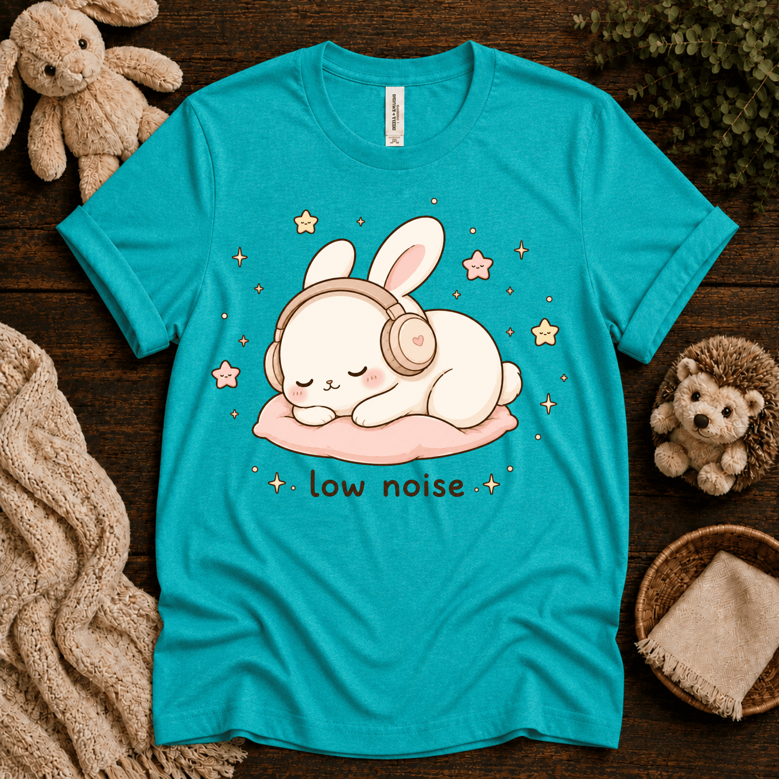 Low Noise Bunny cute animal graphic t-shirt cozy flat lay in heather sea green.