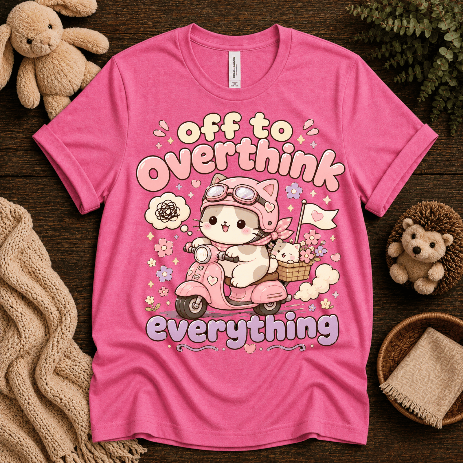 Overthink Cat cute animal graphic t-shirt cozy flat lay in charity pink.