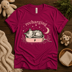 Recharging Cat cute animal graphic t-shirt cozy flat lay in berry.