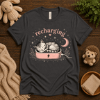 Recharging Cat cute animal graphic t-shirt cozy flat lay in asphalt.