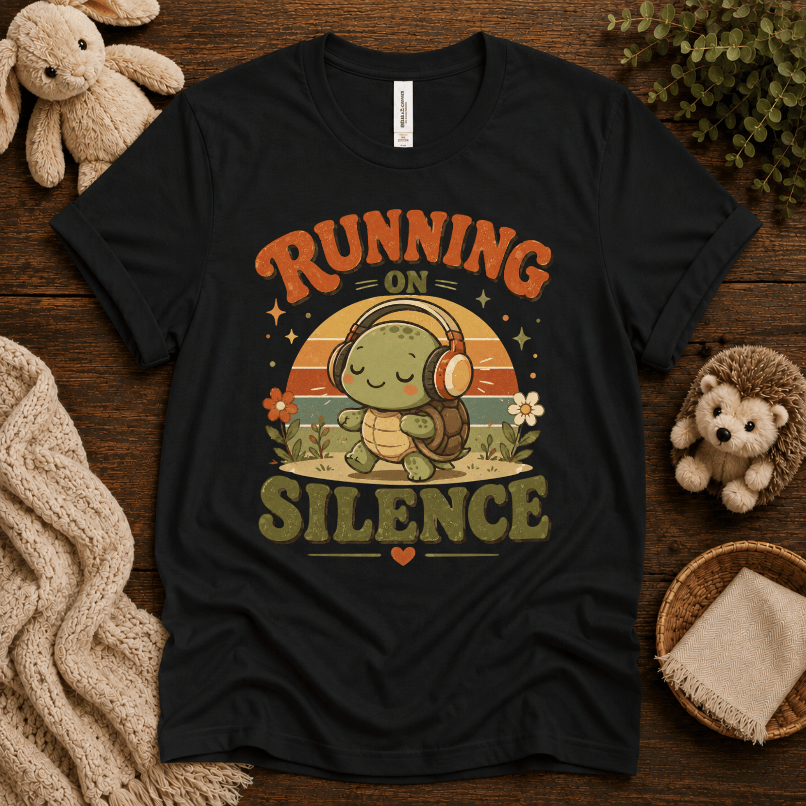 Running On Silence cute animal graphic t-shirt cozy flat lay in vintage black.