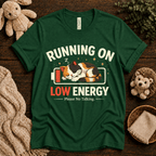 Low Energy Cat cute animal graphic t-shirt cozy flat lay in evergreen.
