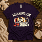 Low Energy Cat cute animal graphic t-shirt cozy flat lay in team purple.