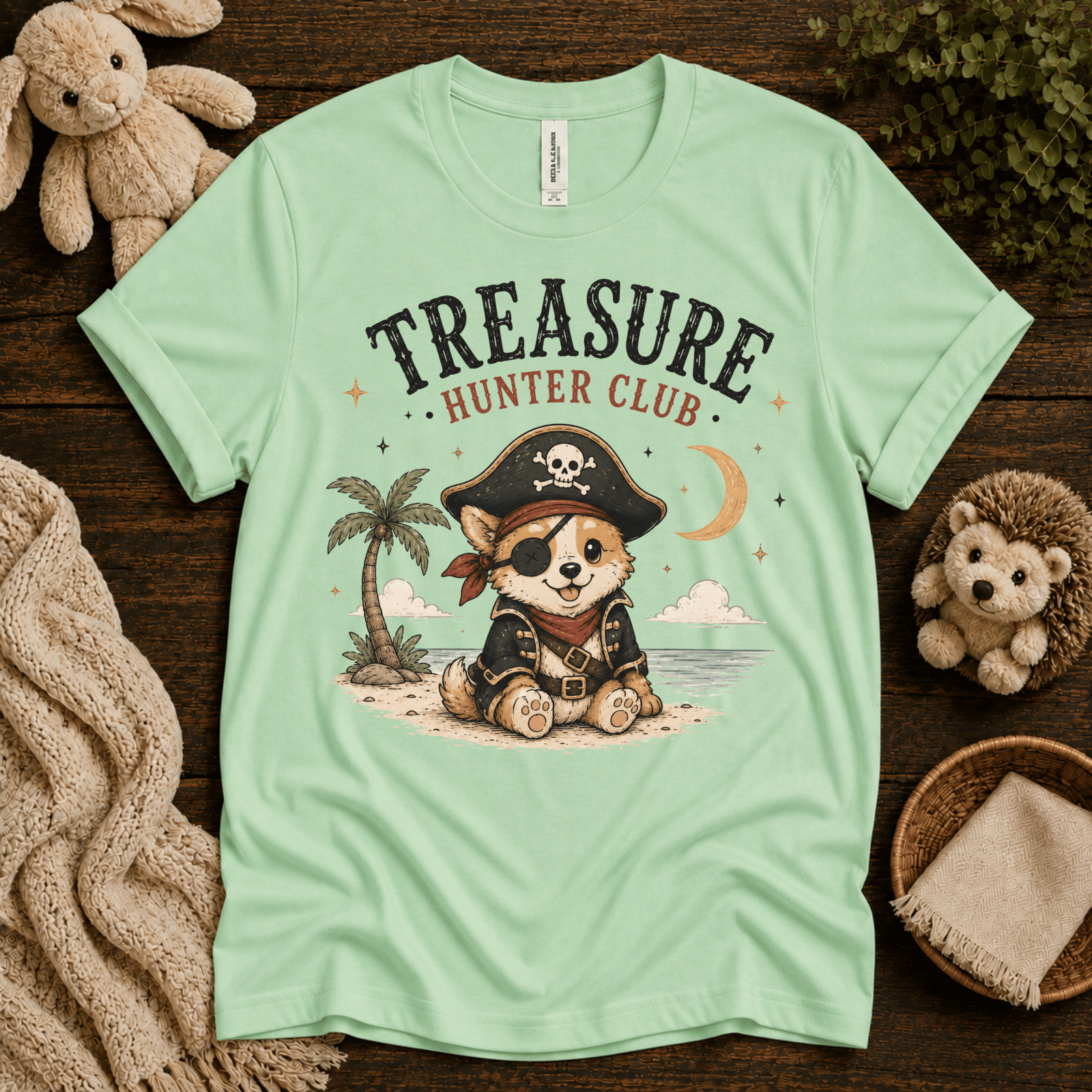 Treasure Hunter Club cute animal graphic t-shirt cozy flat lay in mint.