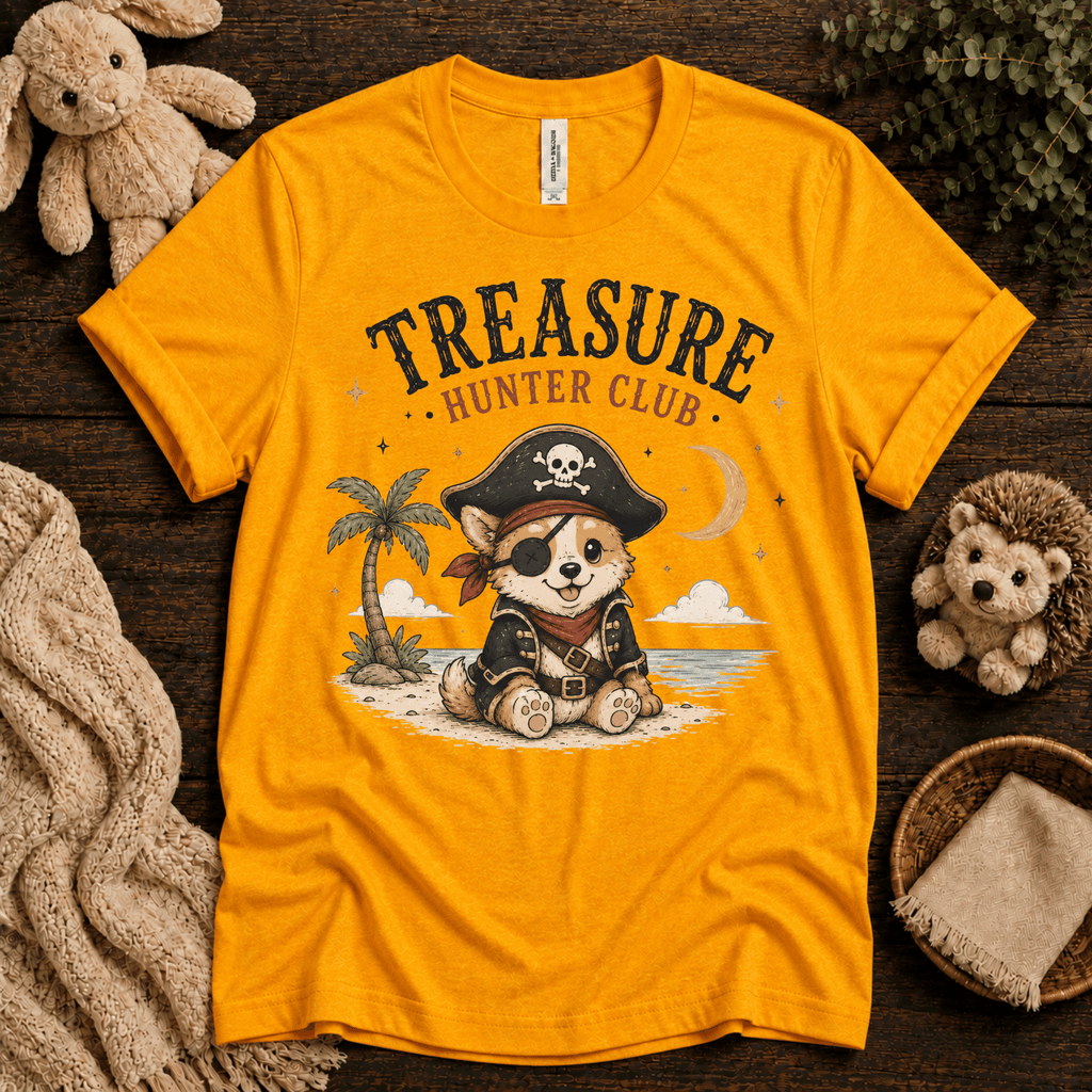 Treasure Hunter Club cute animal graphic t-shirt cozy flat lay in gold.