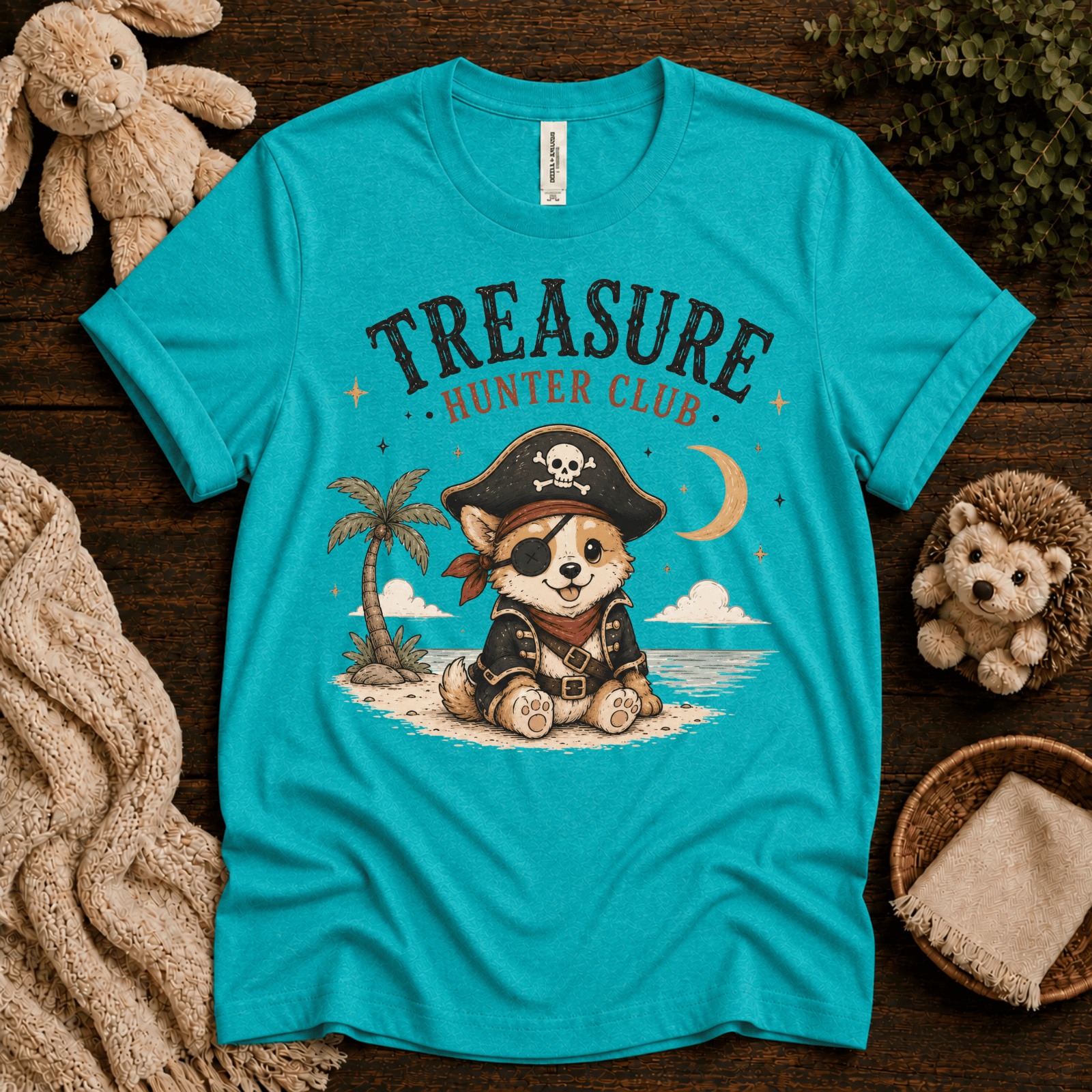 Treasure Hunter Club cute animal graphic t-shirt cozy flat lay in heather sea green.