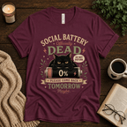 Social Battery Dead funny introvert graphic t-shirt cozy flat lay in maroon.