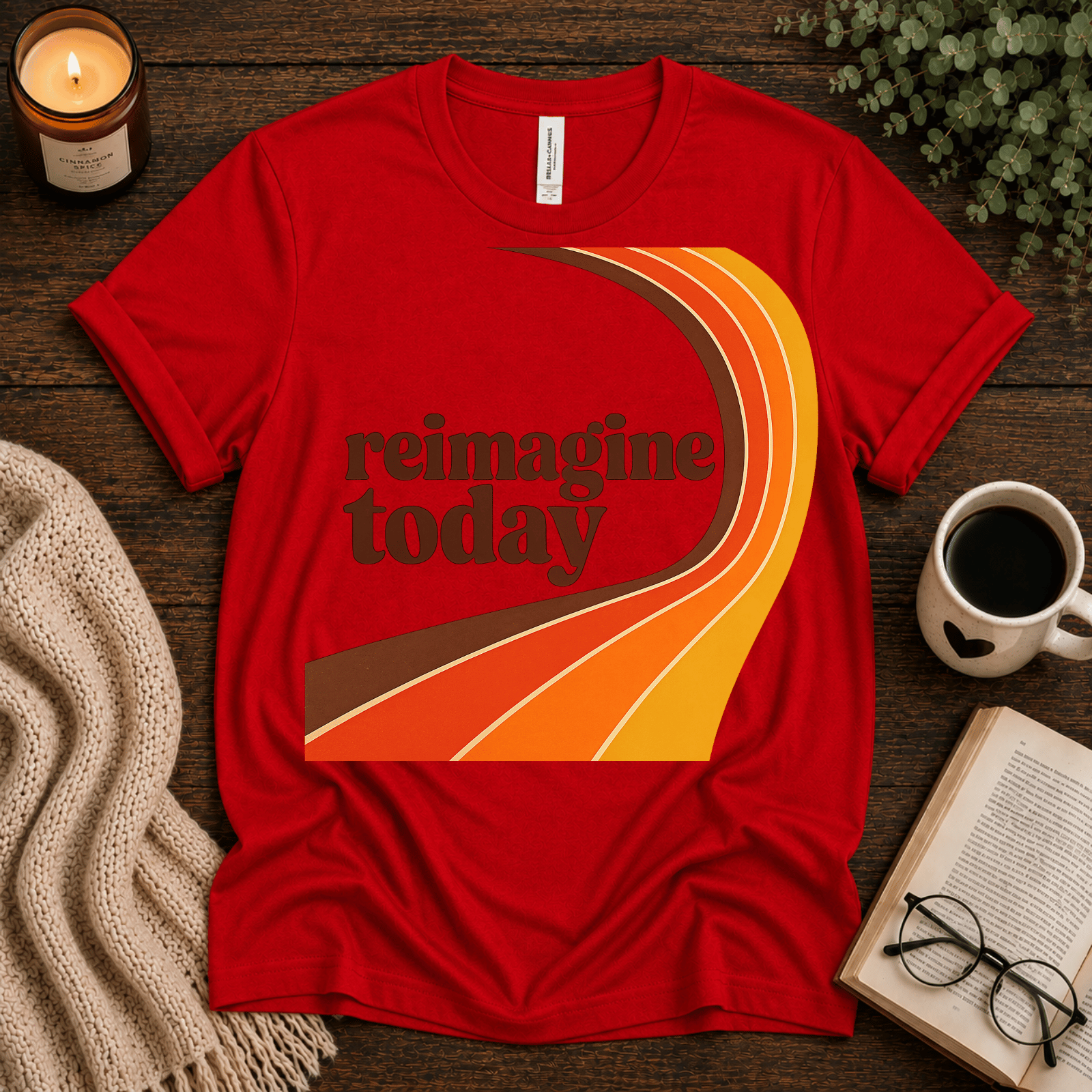 Reimagine Today inspirational introvert graphic t-shirt cozy flat lay in red.