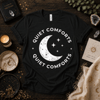 Quiet Comforts magic celestial graphic t-shirt cozy flat lay in vintage black.