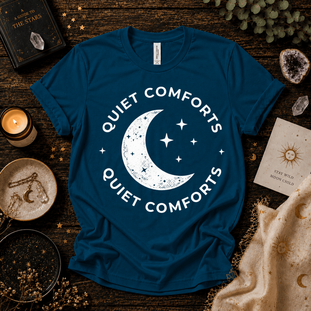 Quiet Comforts magic celestial graphic t-shirt cozy flat lay in deep teal.